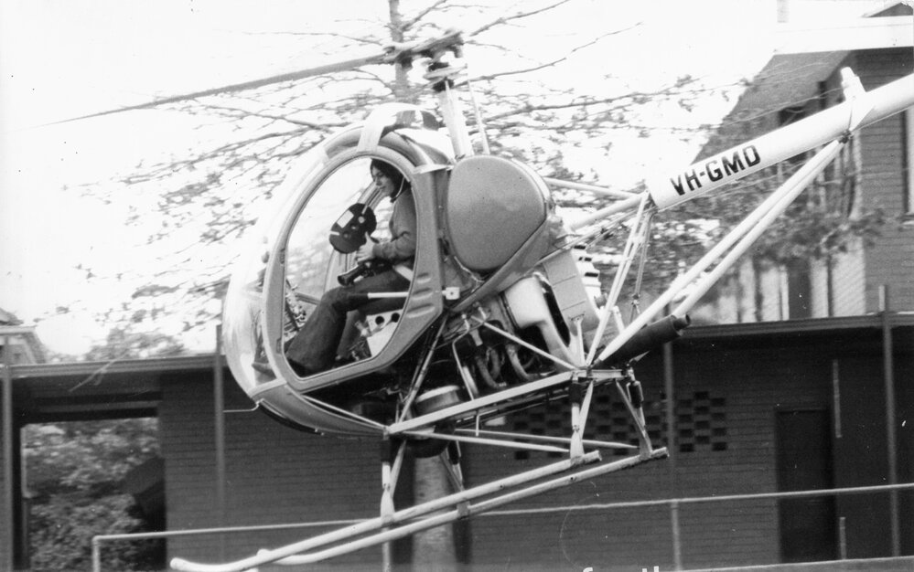 Helicopter landing on Sandell oval, 1973