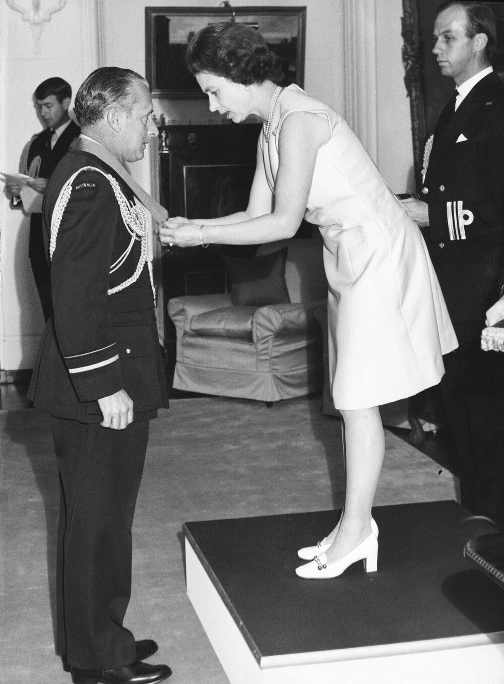 Brian Eaton receiving CBE from Queen Elizabeth II, 1959