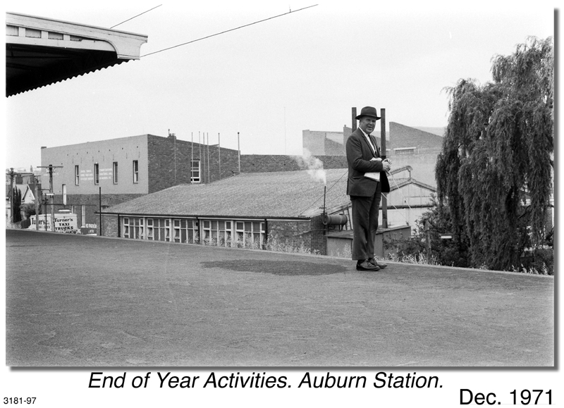 Unidentified gentleman standing on platform at Auburn Railway Station, 1971