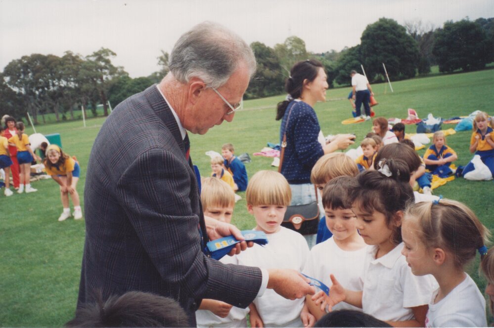 Don Brown with students at Sport Day, circa 1990