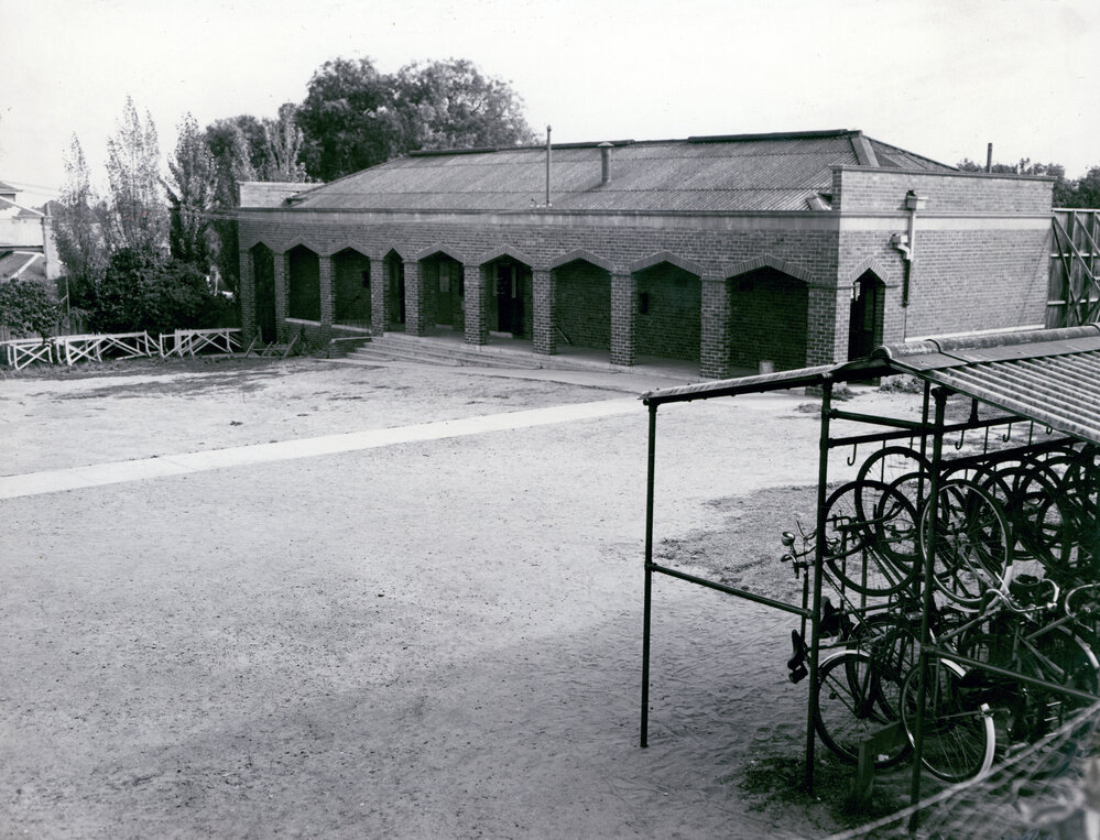 Science block and bicycle storage racks, 1955