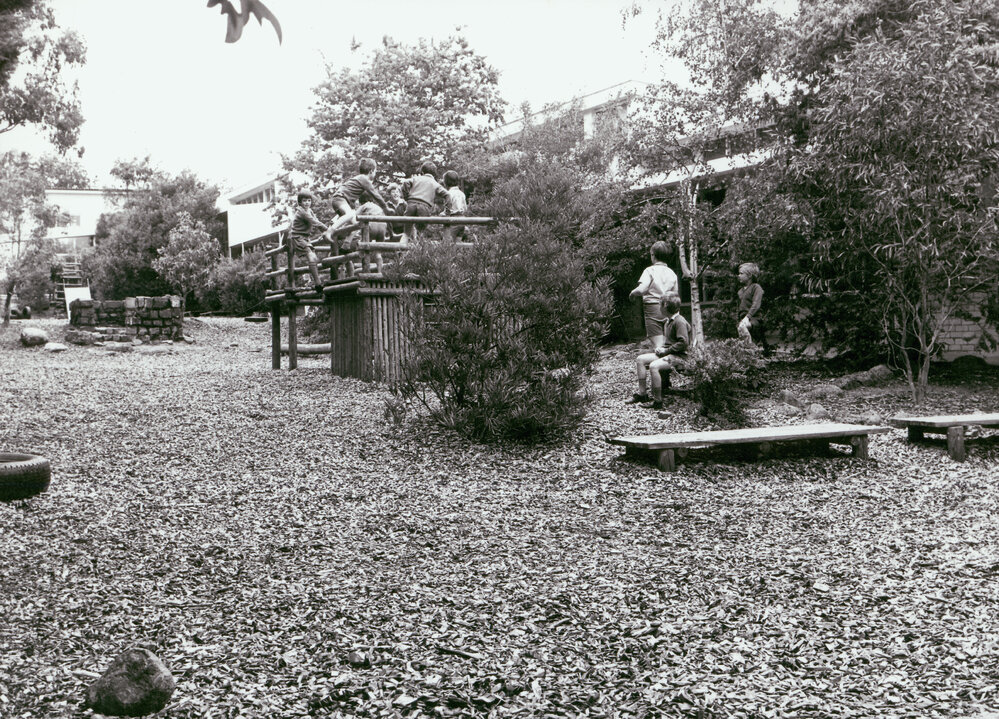 Students playing on climbing frame in new Preparatory School, circa 1959
