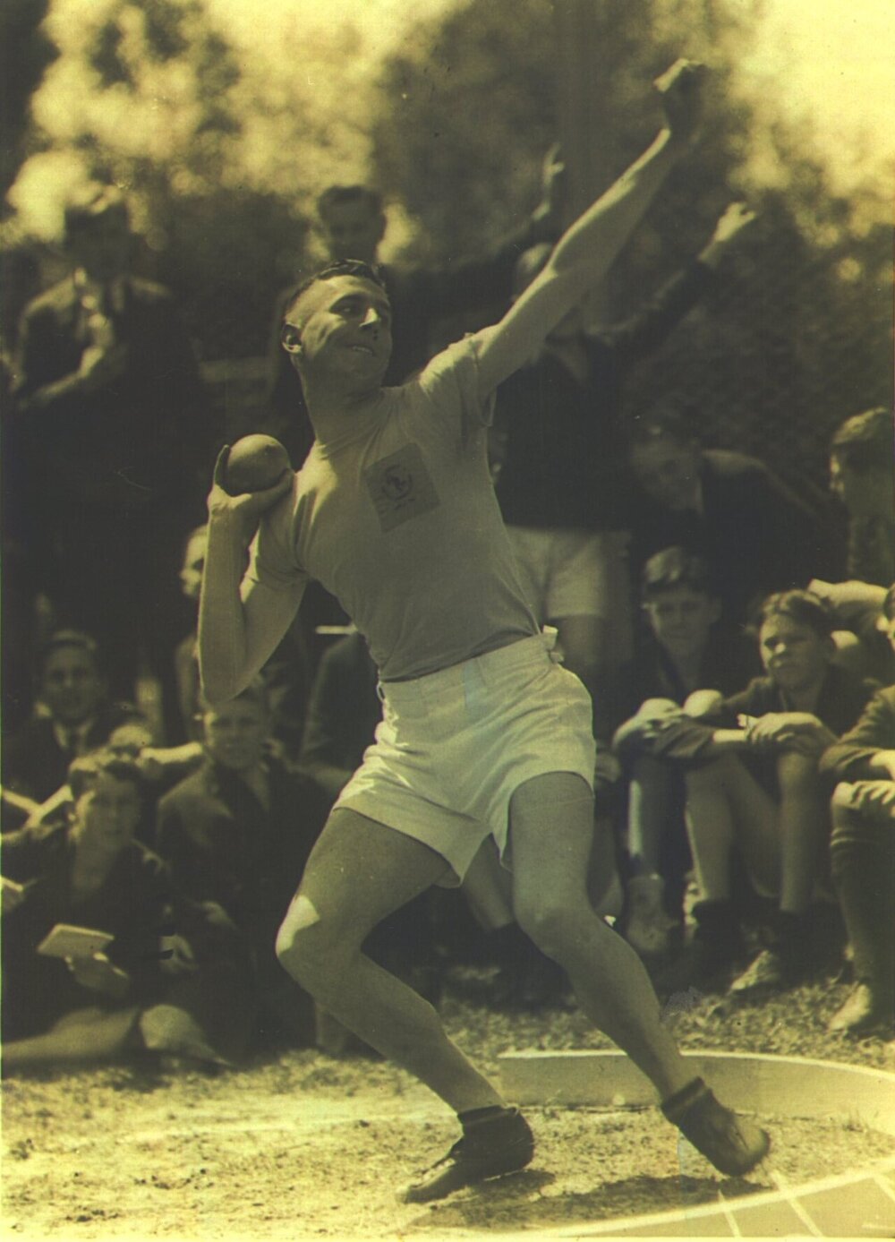 Alec Jamieson with shot put, 1929