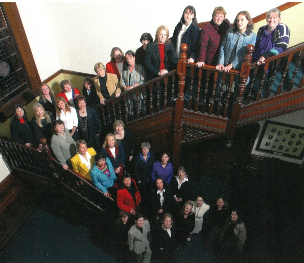 First intake of girls on the stairs of Urangeline, 2003