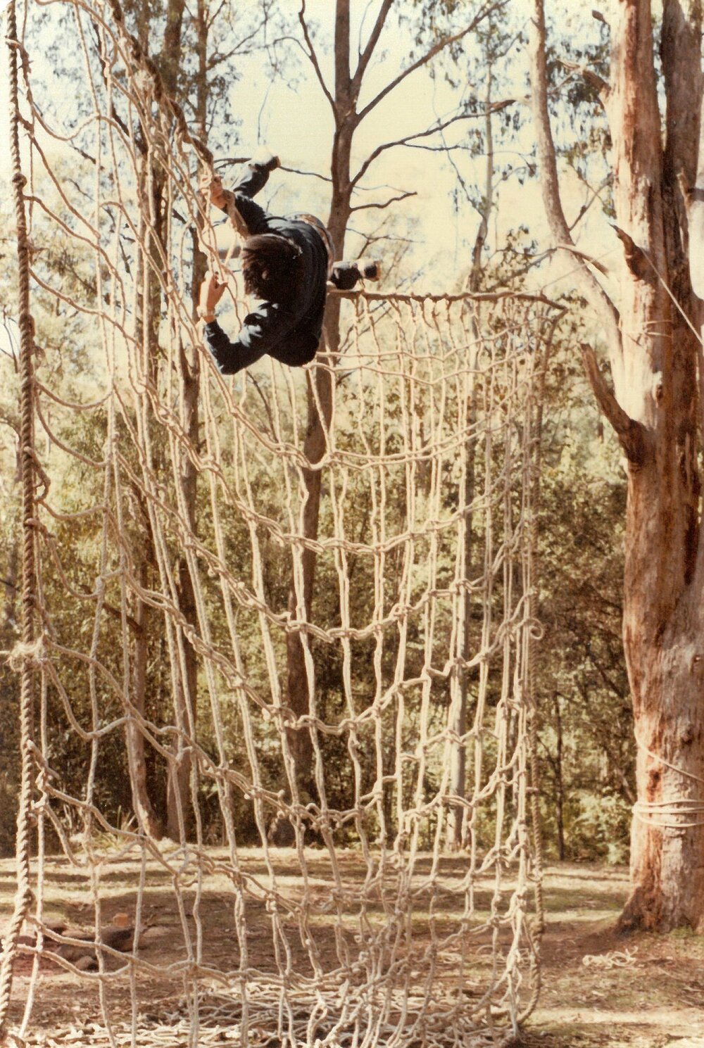 Climbing commando nets at 8E Buxton Camp, 1978