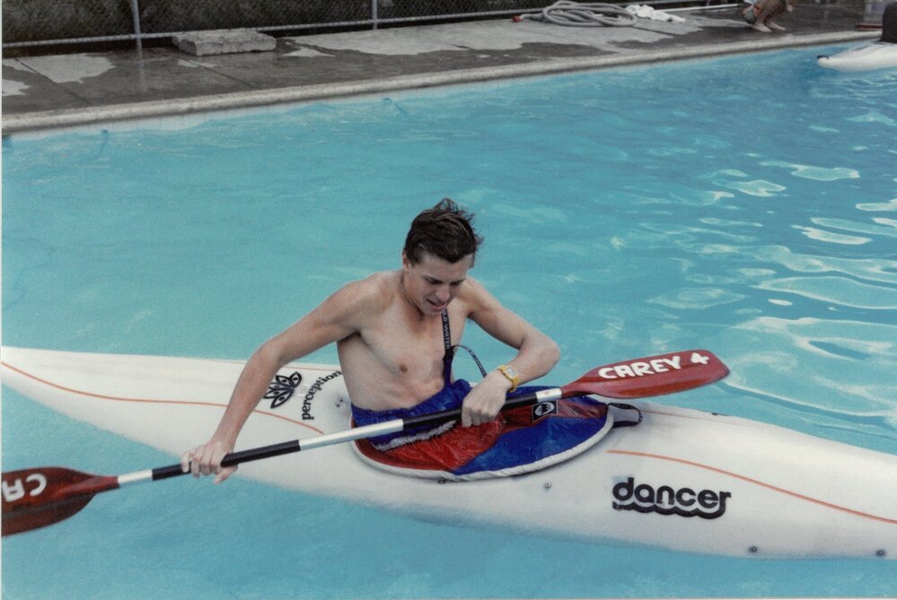 Practising rolling of canoe in Junior School pool, 1989