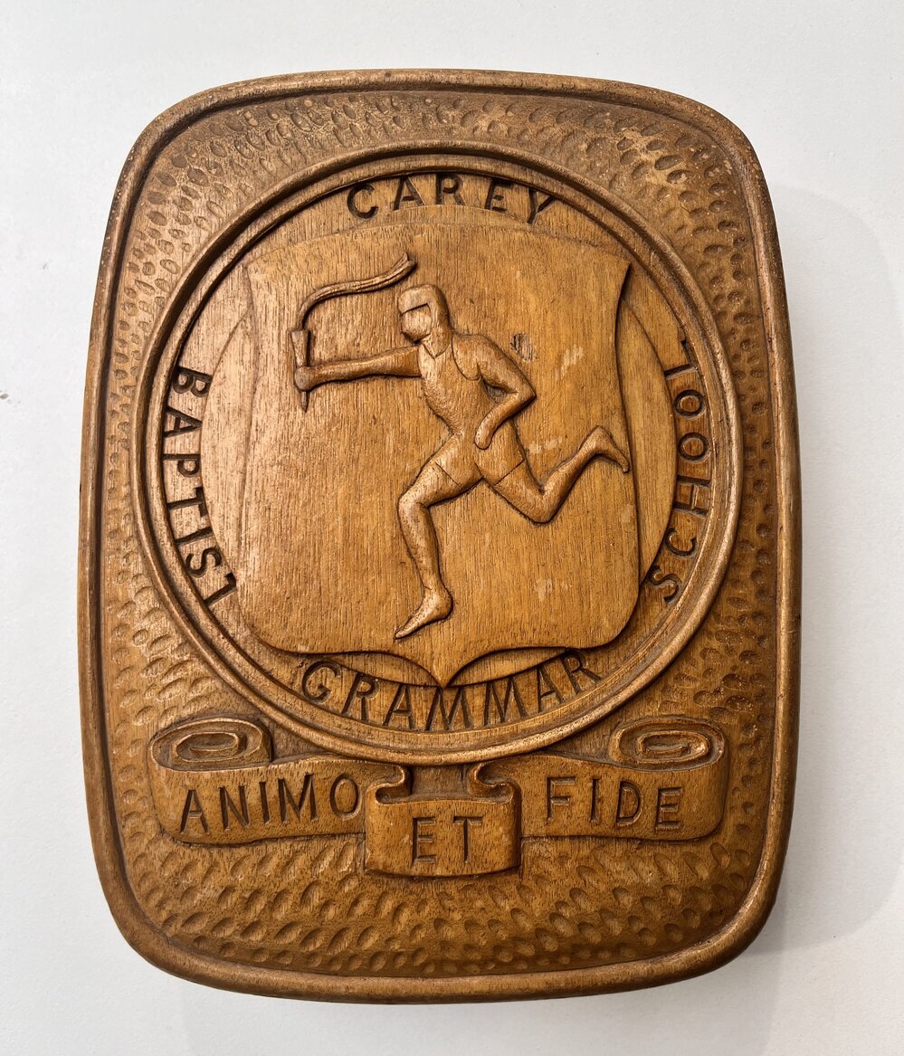 Wooden carving of Carey crest, 1930s