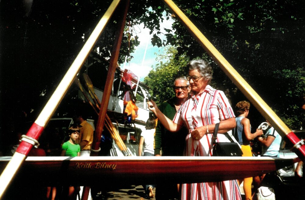 Bernice Bilney christening the 'Keith Bilney' rowing boat, 1980s