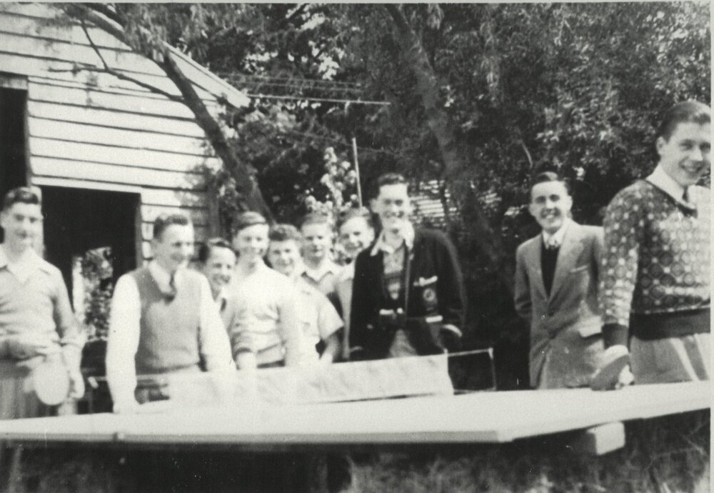 Makeshift table tennis table on hay bales, circa 1953