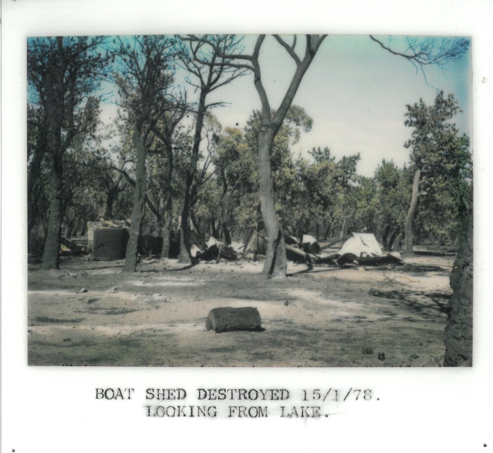 Boat shed destroyed by bush fire (looking from lake), 1978