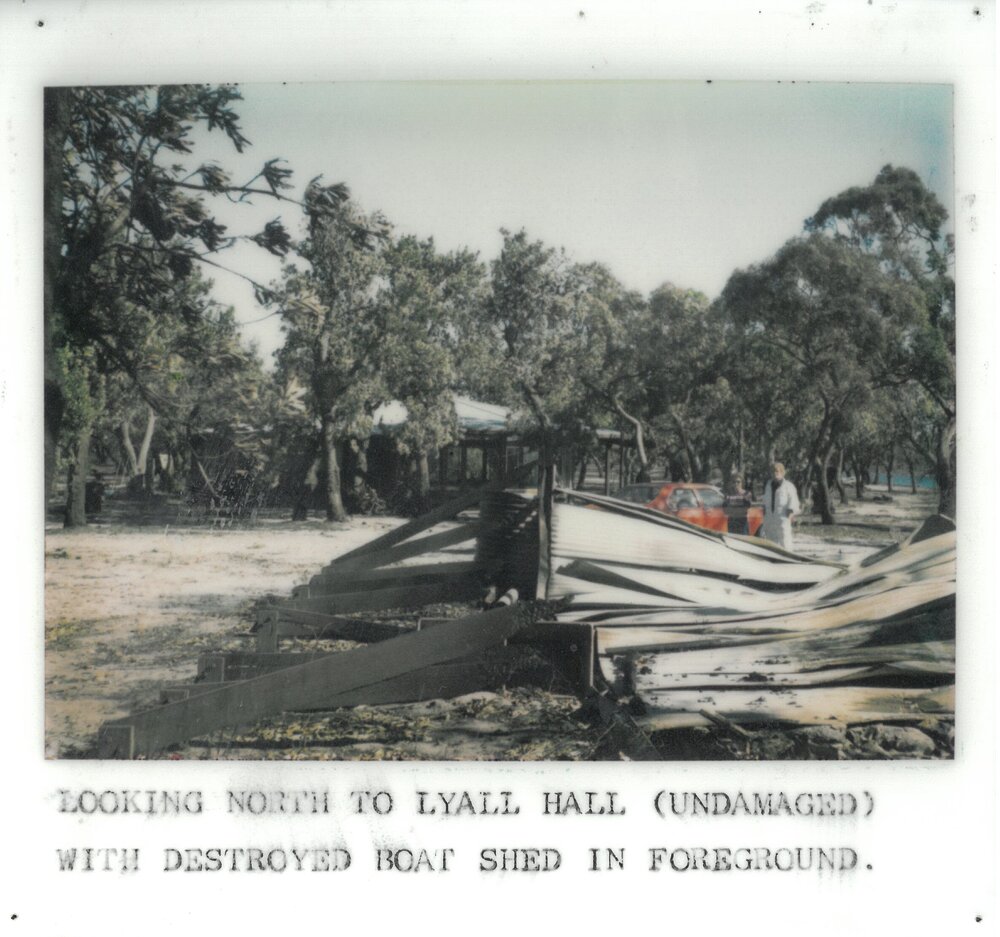 Looking north to undamaged Lyall Hall with destroyed boat shed in foreground, 1978