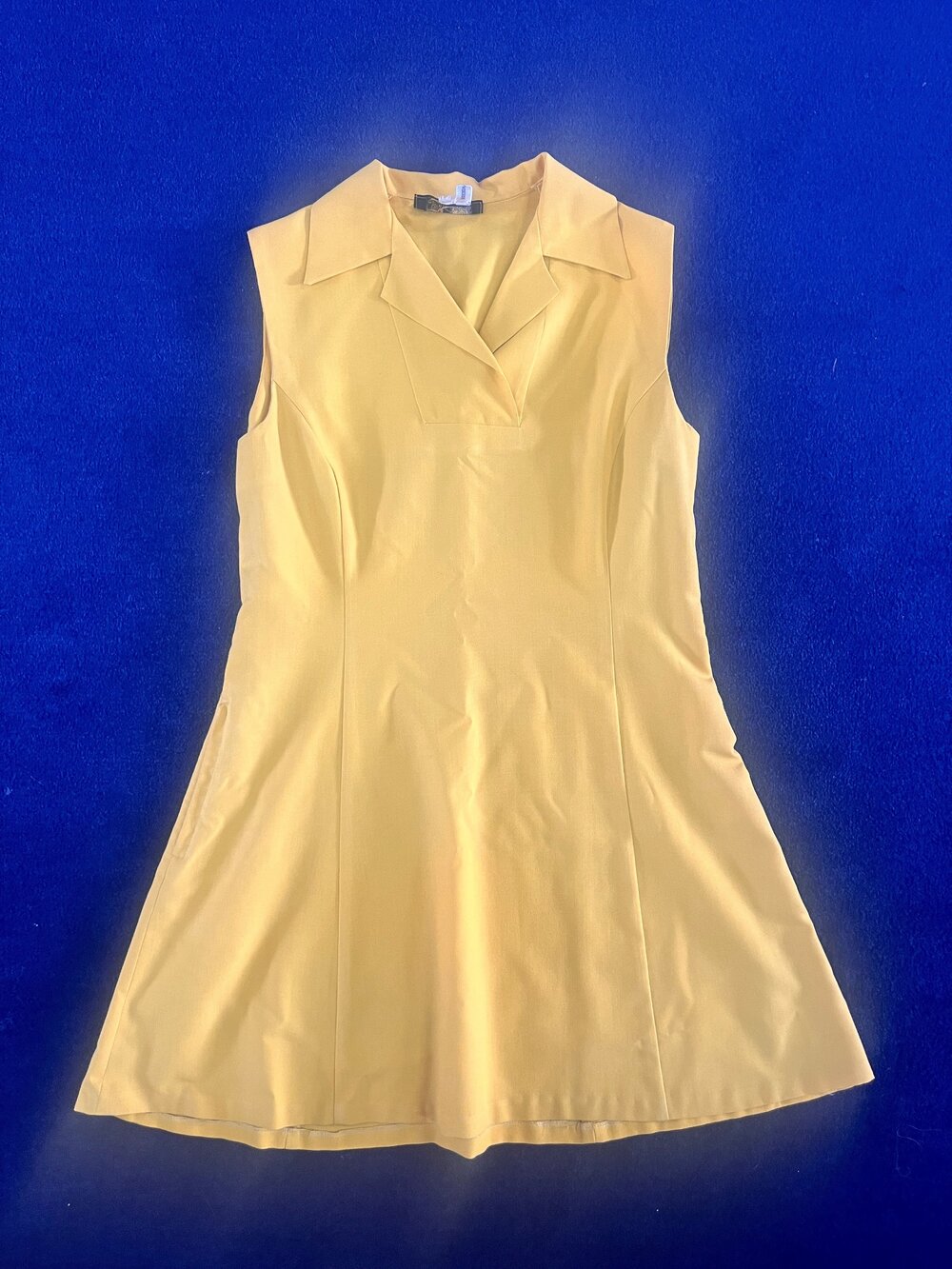 Girls' gold regulation sports dress, 1979
