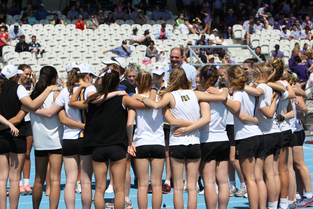Philip Grutzner with Girls Athletics, 2013