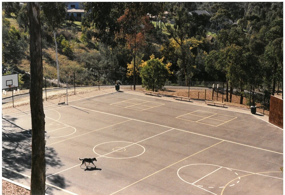 Newly sealed basketball courts, 1989