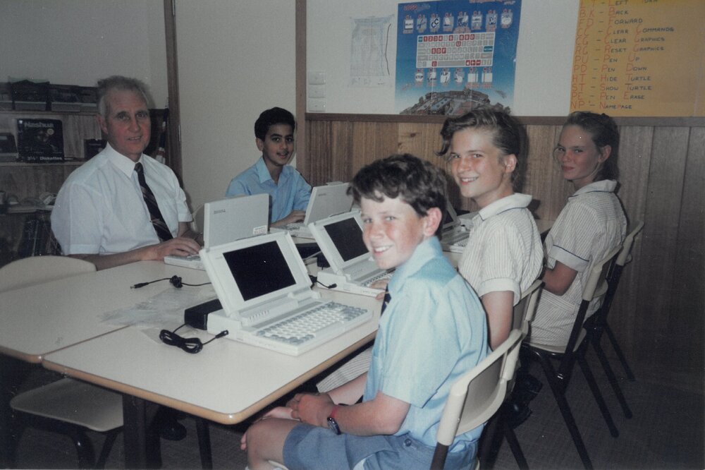 Don Brown with Year 7 students using Toshiba laptops, 1991
