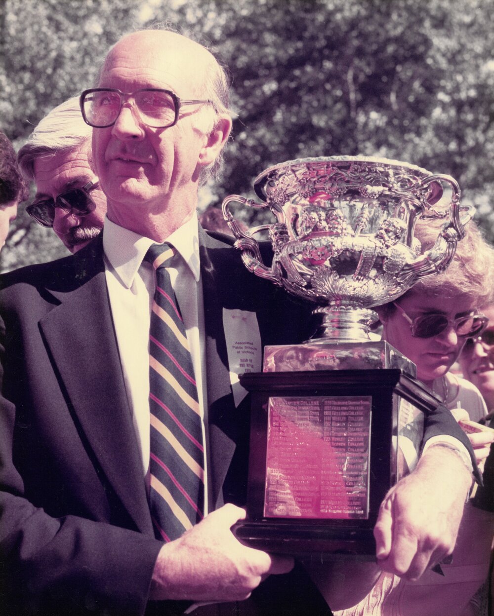 Mr Gerard Cramer holding the Fairbairn Challenge Cup, 1985