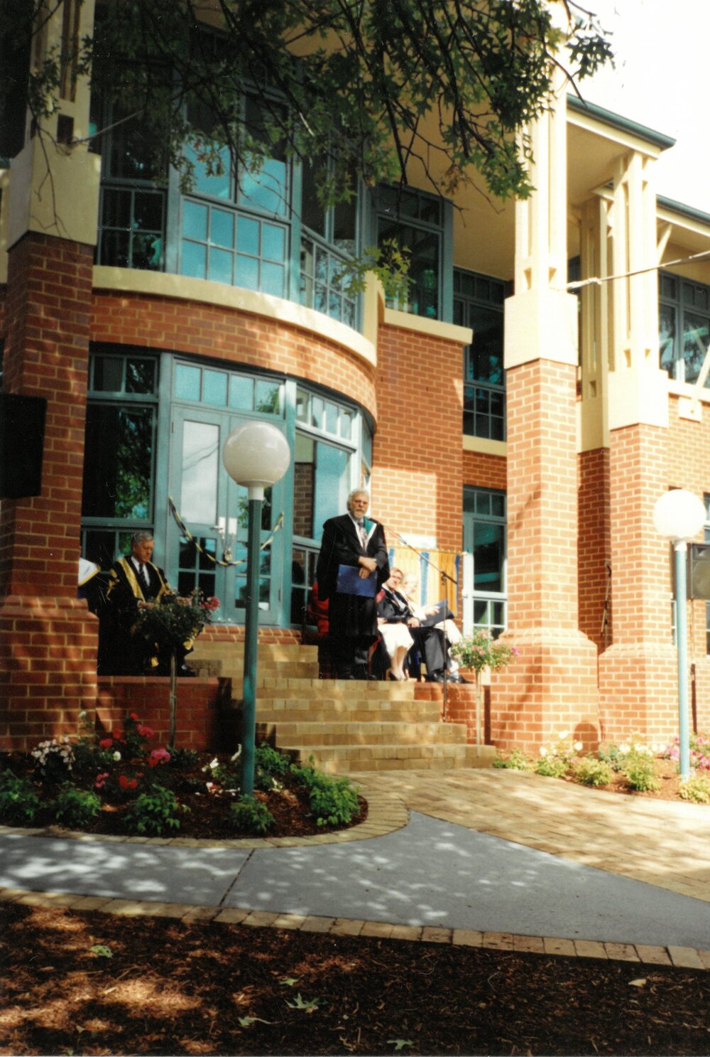 Rev John Hickman at opening of S. L. Hickman Building, 1994