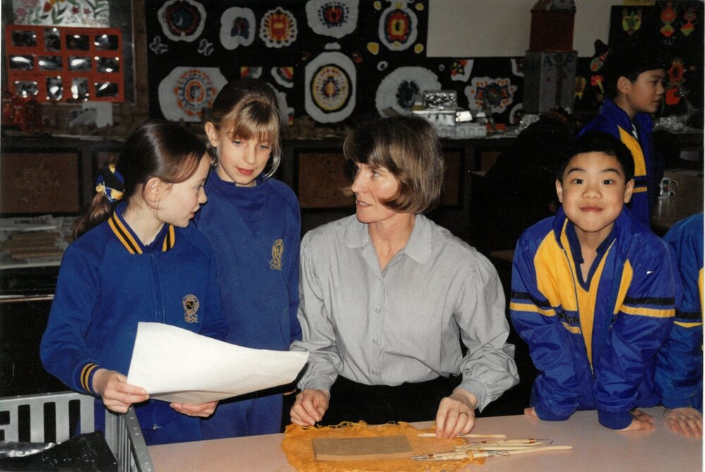 Linda Risby Andrews and students, circa 2000