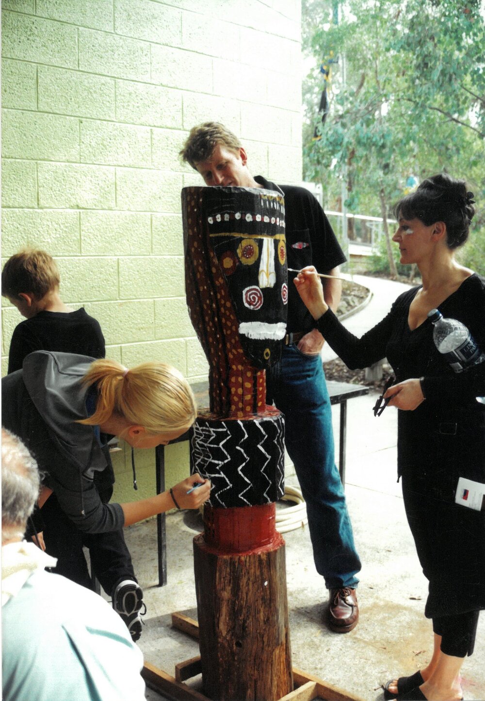 Painting indigenous totems at Donvale campus, 2000