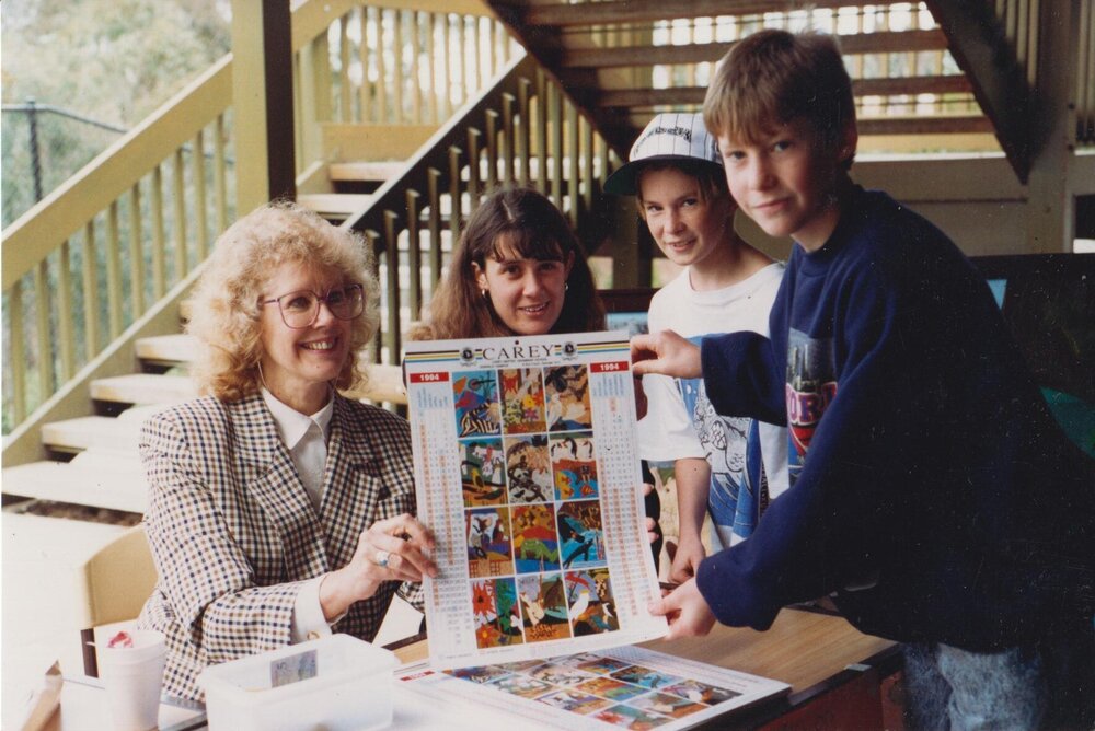 Wendy Weeks displaying the Donvale wall calendar, 1994