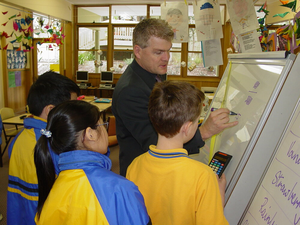 Steve Wilson teaching maths to Donvale students, 2004