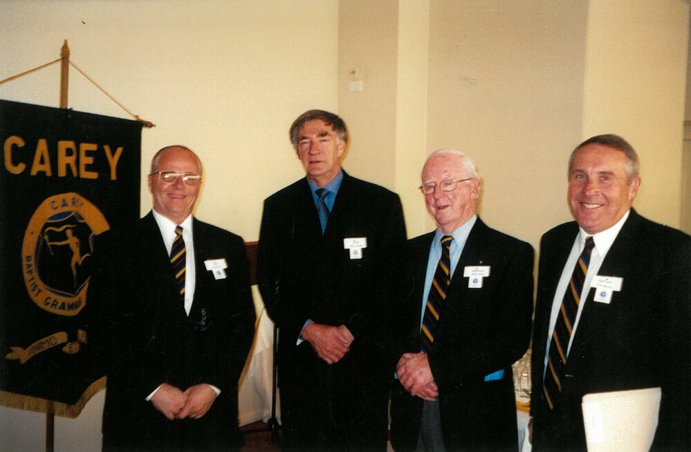 Ian Woolf, Ross H. Millikan, Arnold Wilcox and Jeff Thomas, 1999
