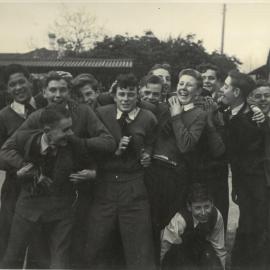 Group of students mucking around and laughing, circa 1952