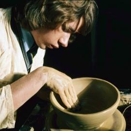 Senior student at the pottery wheel, 1974