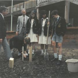 Planting tree for opening of Donvale, 1989