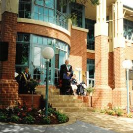 Rev John Hickman at opening of S. L. Hickman Building, 1994