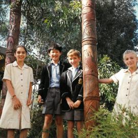 Donvale students posing with the 'Esprit de Corps' sculpture, 1999