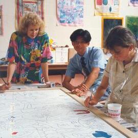 Donvale art teacher Wendy Hirt creating jigsaw mural with students, circa 1991