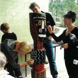 Painting indigenous totems at Donvale campus, 2000