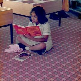 Student reading in the Donvale campus library, 1991