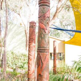 Totems created to camouflage the support posts of the amphitheatre shade sails, 2014