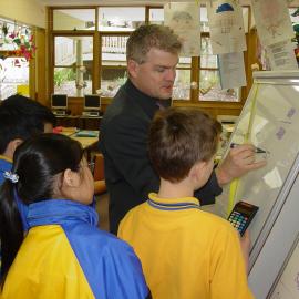 Steve Wilson teaching maths to Donvale students, 2004