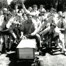 Bill Sandilands gets a farewell push from boys, 1989