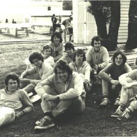 Rowing crew relaxing, 1970s