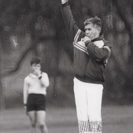 Max Drummy umpiring football match, 1990s