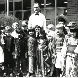 Don Brown with Junior School students in costume, 1980s