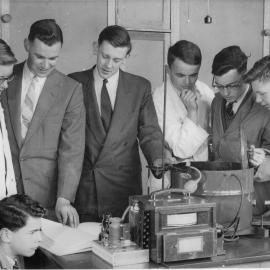 Dr. B. Spicer and J. Baglin visit the lab, 1958
