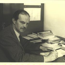Arthur Sandell at desk, 1962