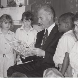 Don Brown reading to students, 1990s