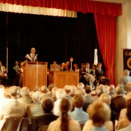 Mr Cramer addressing assembly in the Memorial Great Hall, circa 1983