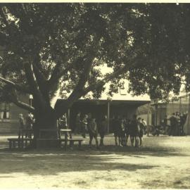 Outside the tuck shop, 1950s