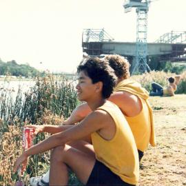 Members of senior rowing team sitting by the banks of the Barwon River, 1989