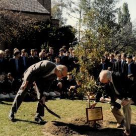 Headmaster G. L. Cramer planting the bicentennial year tree, 1988