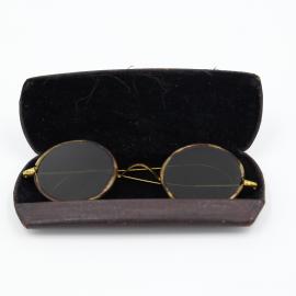 H.G. Steele's gold rimmed sunglasses and leather case, 1930s