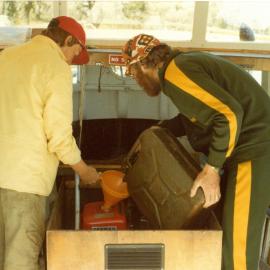 Filling up Toona Foam with jerry can, 1979