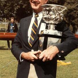 Gerard Cramer holding the Fairbairn Cup, 1985